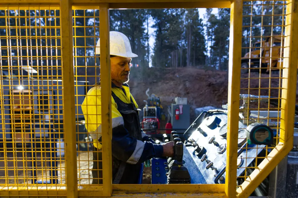 Driller operating rig from guarded control zone